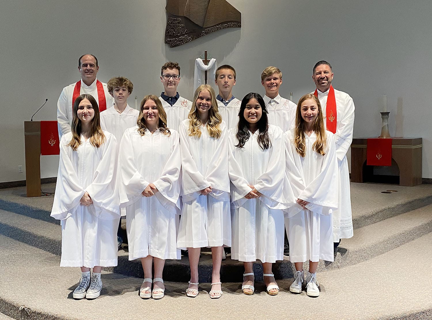 Pastor Mark and Pastor Jeremy with Confirmation Class 2025 graduates